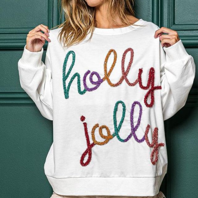 Celeste - Festlig utsmyckad sweatshirt med "Holly Jolly" bokstäver