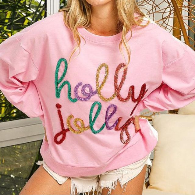 Celeste - Festlig utsmyckad sweatshirt med "Holly Jolly" bokstäver