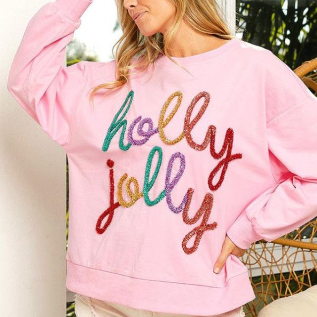 Celeste - Festlig utsmyckad sweatshirt med "Holly Jolly" bokstäver