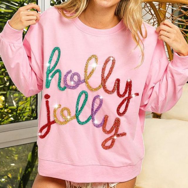 Celeste - Festlig utsmyckad sweatshirt med "Holly Jolly" bokstäver