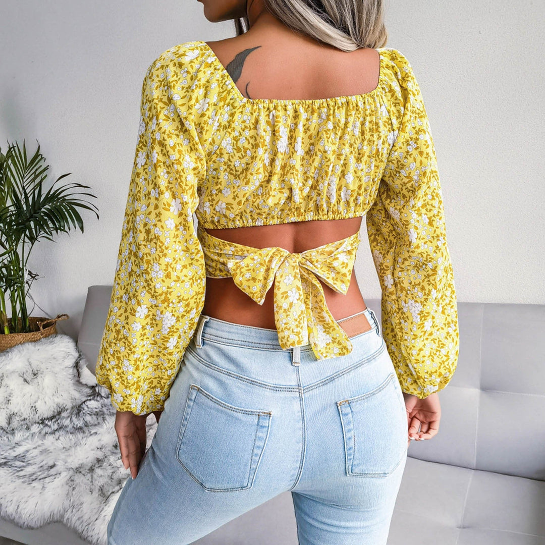 Jasmine - Blommönster crop top med långa ärmar